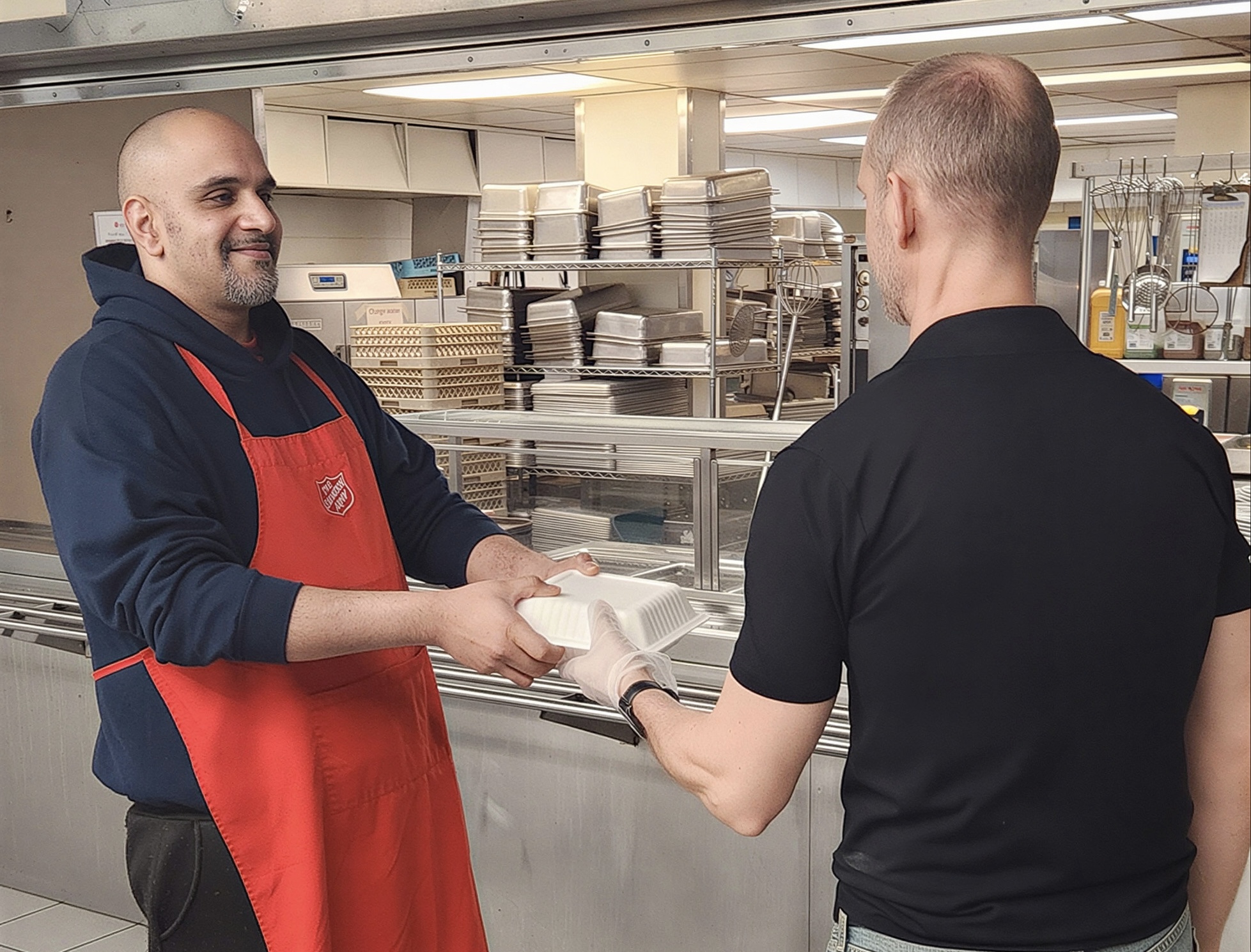 Gee volunteers in the kitchen